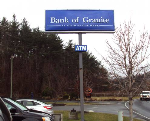 pylon sign at bank of granite